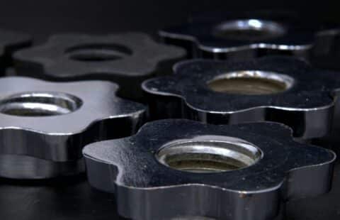 Silver gears with rounded edges.